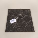 A heavy bronze sundial,