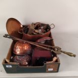 A selection of copper items including four jelly moulds, copper measures,