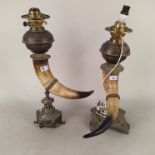 Two ornamental horn lamps on brass bases