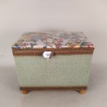 A Lloyd Loom style lidded basket plus a wool rug/blanket,