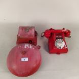 A vintage fire alarm plus a red painted Bakelite phone (reputed to have originated from R.A.F.