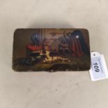 An antique Toleware hand painted snuff tin with interior scene and dogs,