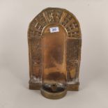 An early 18th Century Dutch sheet brass repousse wall sconce,