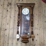 An Edwardian twin weight walnut cased Vienna 'regulator' wall clock,