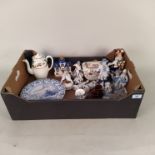 Assorted china including Staffordshire and German figurines, a pair of Delft plates,