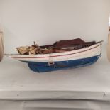 A wooden model boat c1900 (with masts and rigging as found),