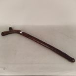 A 19th Century Fijian fighting stick with shallow carved section and carving to club,