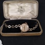 A lady's 9ct gold Tudor Royal on 9ct gold strap, also marked Rolex,