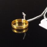 A 22ct gold wedding band, weight approx 4.