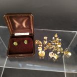 A collection of 9ct gold and yellow metal earrings (some pairs)