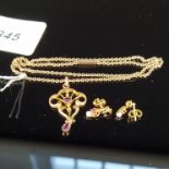 An Art Nouveau style 9ct gold pink stone set pendant on 9ct gold chain,