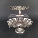 Two silver pedestal base pierced design comports, both hallmarked Sheffield,