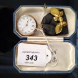 A 9ct gold lady's fob watch with a yellow metal heart and bow shaped brooch,