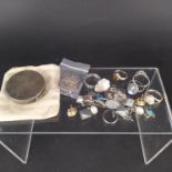 A mixed lot of silver items including six silver rings, silver earrings, cufflinks,