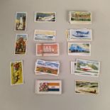 An album of European first day covers, some loose, a box of loose stamps,