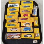 Approx nineteen boxed Dinky vehicles plus Esso petrol pumps,