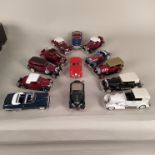 A selection of approx nineteen mixed die cast vehicles,