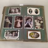 A vintage postcard album with many Edwardian era actresses,