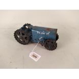 A vintage tin plate clockwork Triang tractor No.