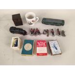 A Tucks 'Zag-Zaw' picture puzzle, vintage playing cards and chess set,