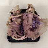 Two antique cloth faced dolls with hand painted features,