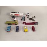 A box of vintage vehicles including Dinky,