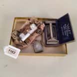 A boxed 'Valet' Auto Strop safety razor plus a plated vesta and vintage opera glasses