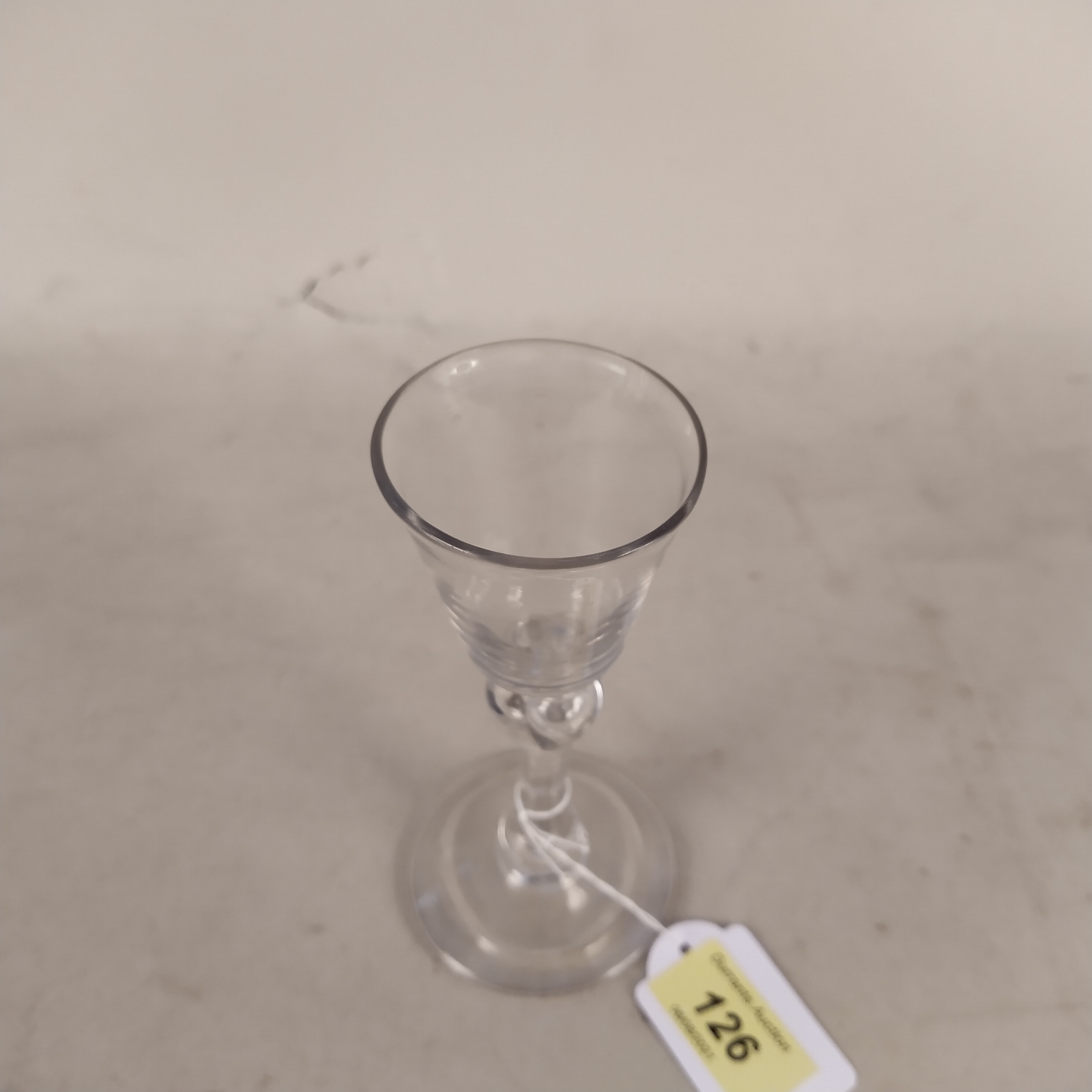 An English wine glass c1740 with ovoid shaped bowl above balustroid stem having recessed shoulder, - Image 2 of 3