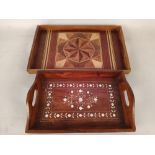 Four vintage inlaid wooden trays, one with flowers,