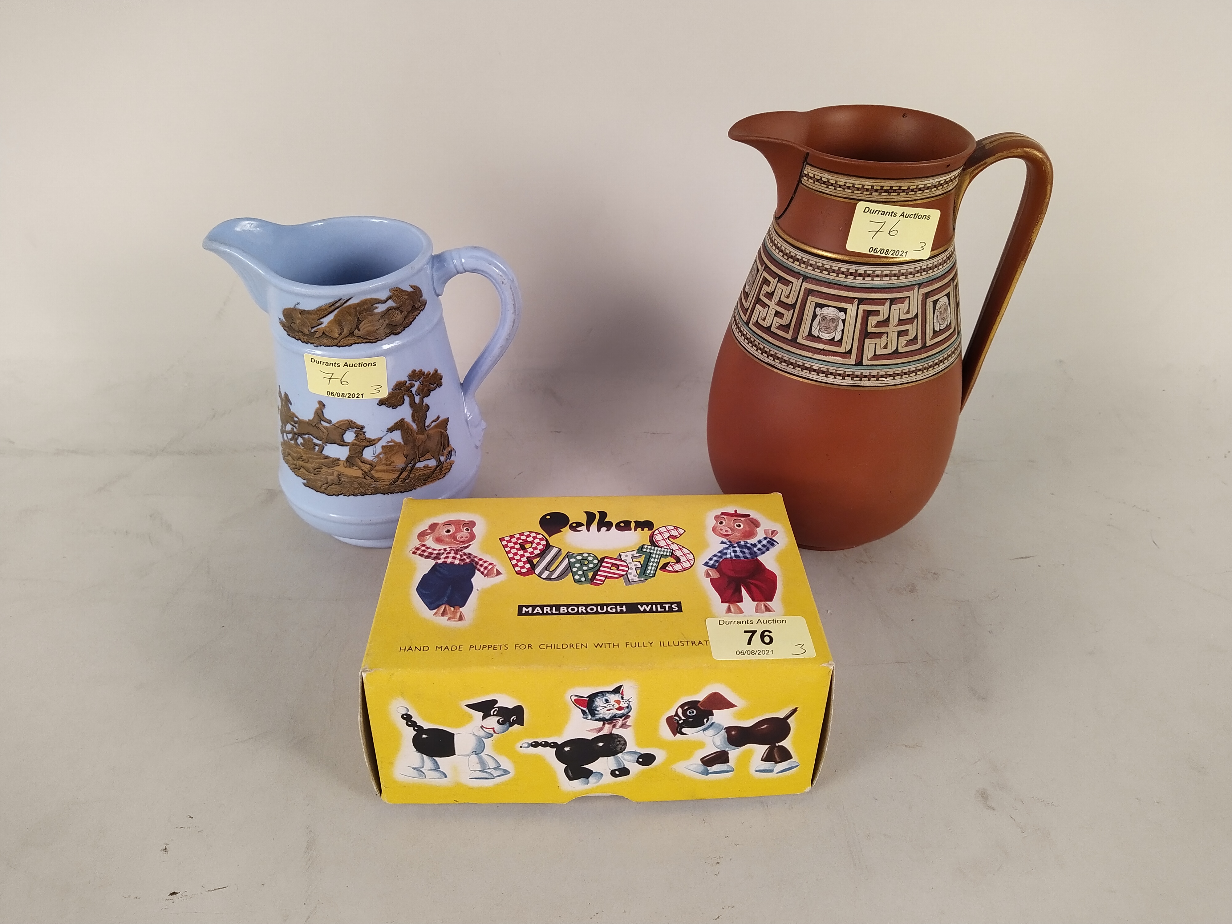 Two Victorian Prattware jugs plus a boxed Pelham puppet 'A7 Bengo'