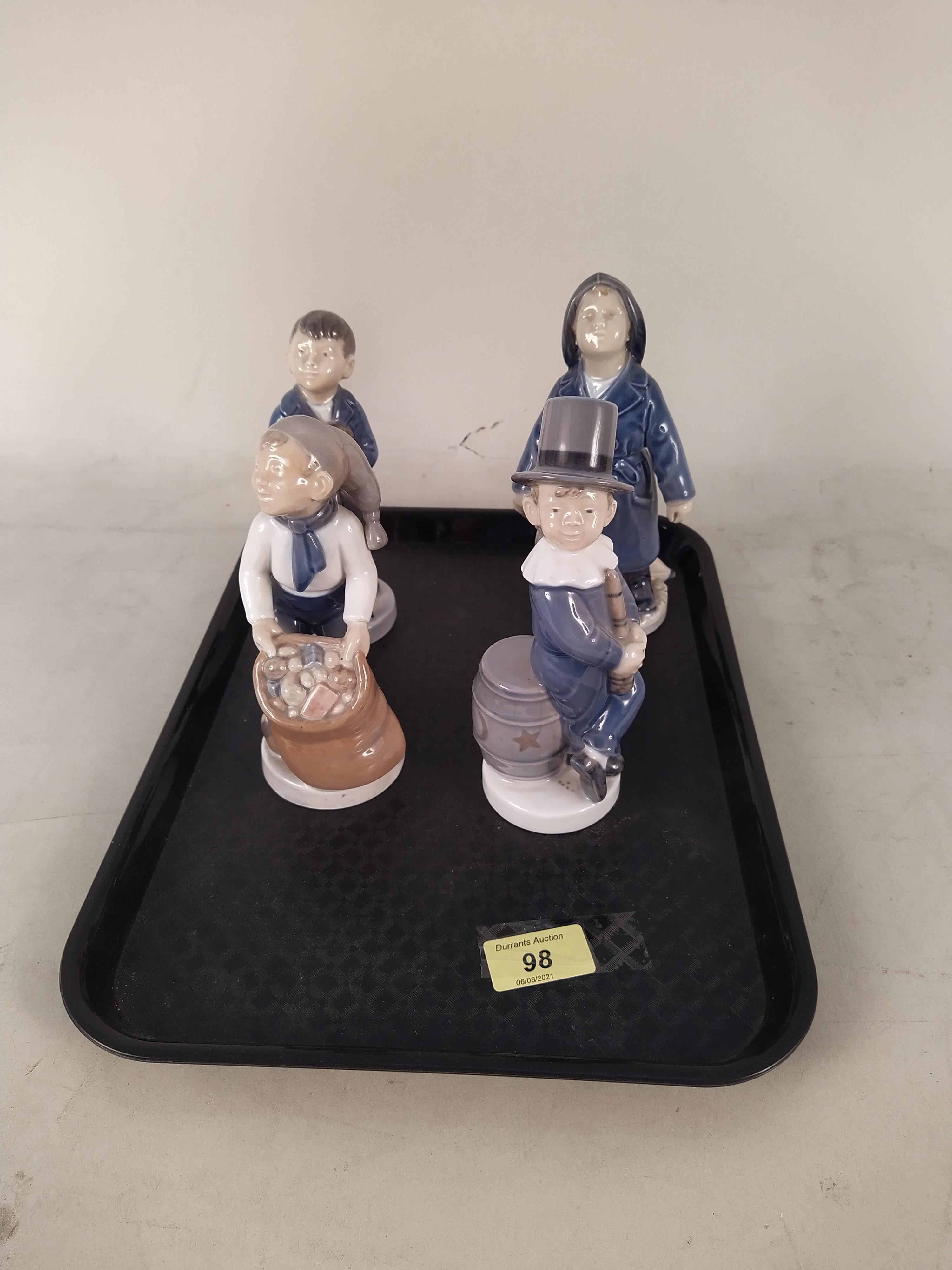 Four Copenhagen boy figurines,