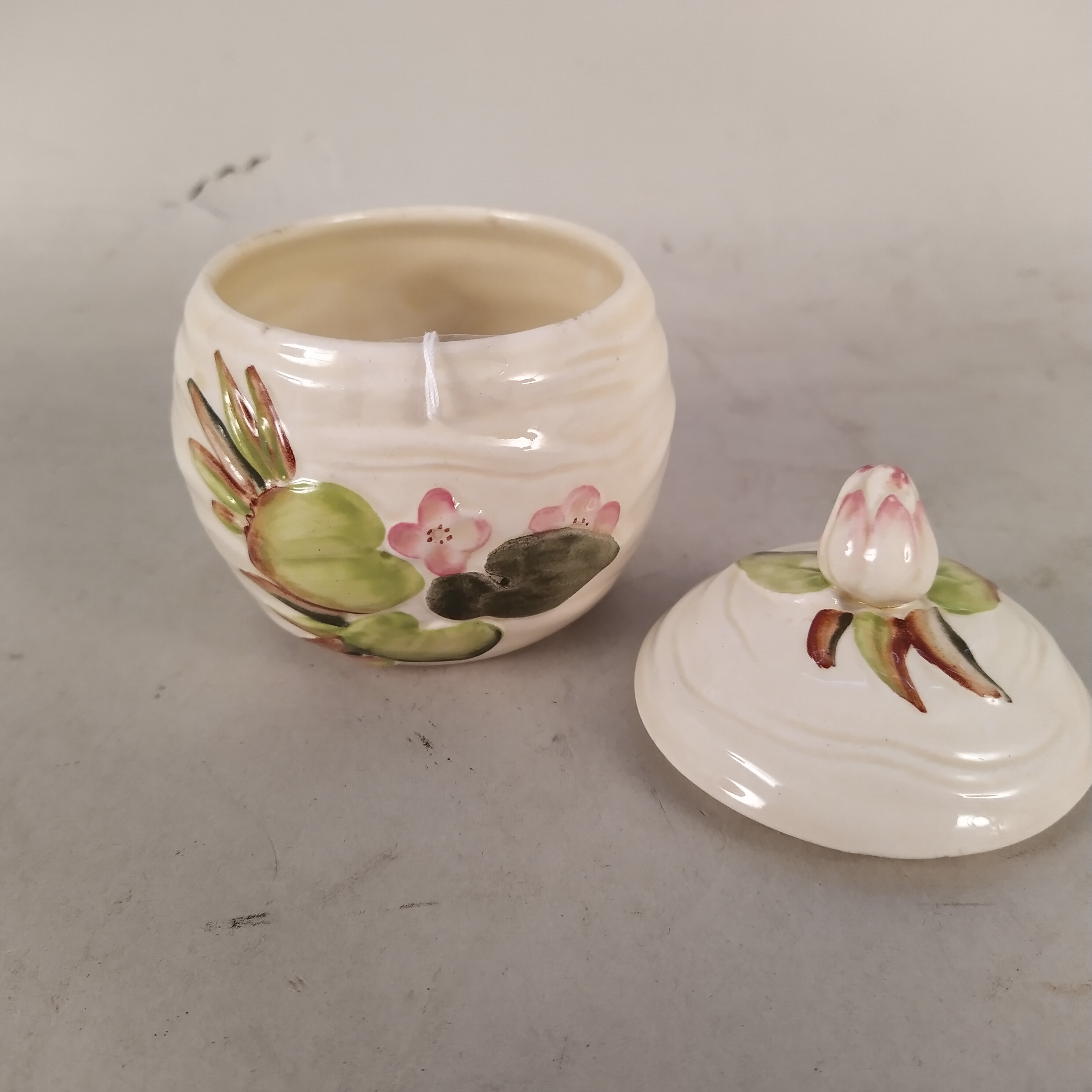 A Clarice Cliff Newport pottery shape 987 jam pot and lid - Image 2 of 3