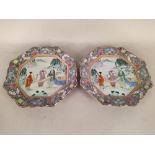 A pair of octagonal Cantonese enamelled plates,