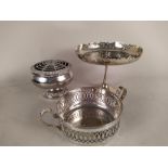 A silver plated tazza plus two other plated items and a pair of red and clear glass bowls