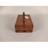 An antique mahogany writing box with double opening lid, ink bottle,