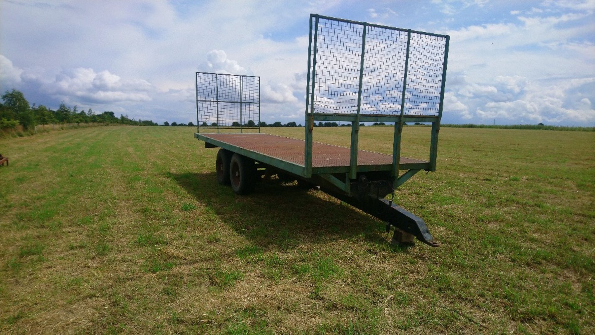 Flat bed trailer, 8m x 2.4m bed 1.3 off ground. Stored near Palgrave, Suffolk.