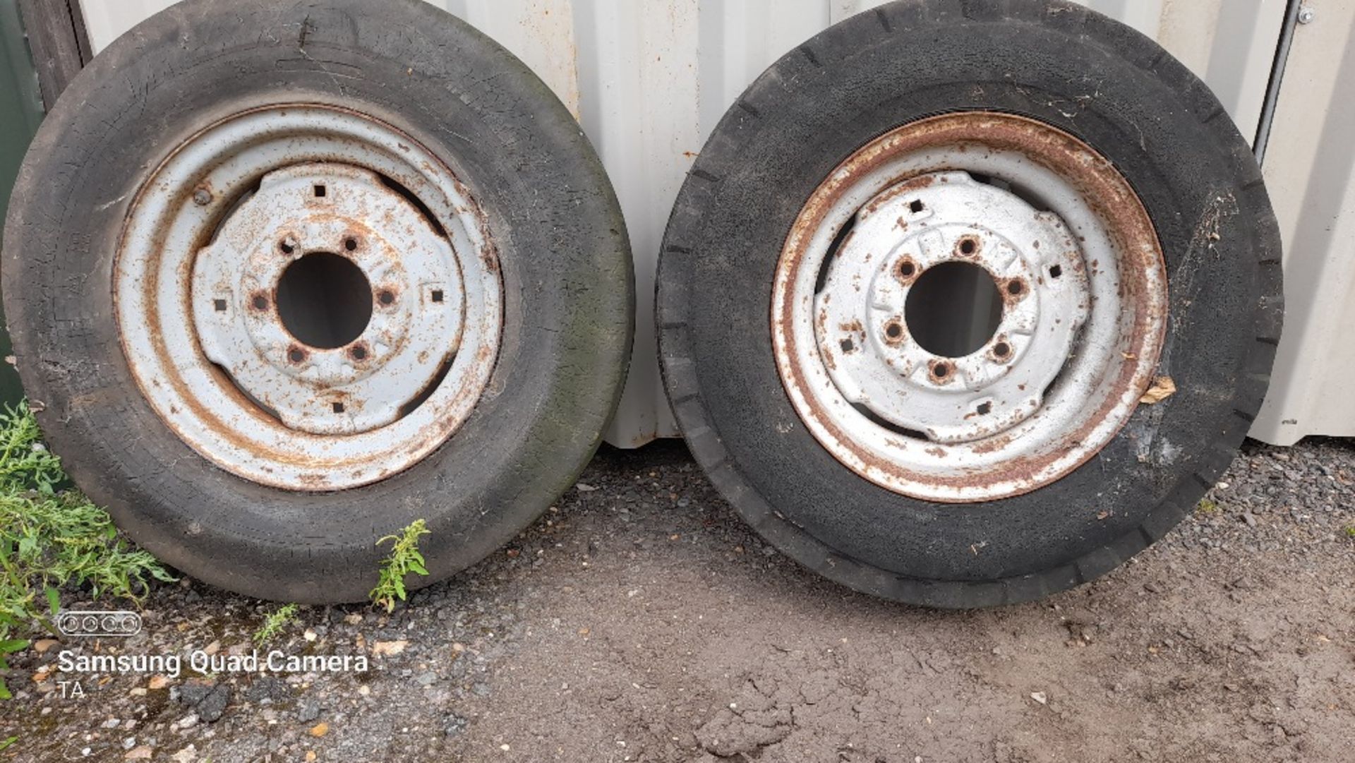 Pair of 750 x 16 front wheels. Stored near Eye, Suffolk.