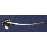 A scarce continental 'boys' toy Cavalry sabre with brass hilt and 19" blade