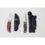 Two hunting knives, one by Buck marked Rocky Mountain Elk Foundation,