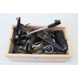 A box of various gun parts etc including locks and a barrel