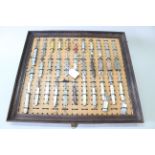 A framed display of approx thirty five various pocket knives