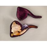 An unusually large Edwardian Meerschaum with silver band to stem, amber mouthpiece detached,