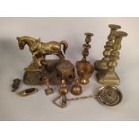 A box of assorted brass ware including a large quantity of cutlery, a preserving pan,