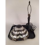 A Tiffany style lamp and shade