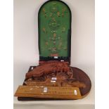 A vintage pin football game plus a shove ha'penny board,