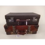 A vintage 'Paxhall' leather suitcase plus a vintage fitted dressing case with two bottles,