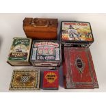 A selection of seven vintage tins including a Junior Shell miniature petrol can plus a Huntley &