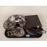 A set of three graduated silver plated serving dishes with lids,