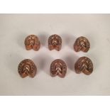 A matched set of six Victorian miniature copper jelly moulds,