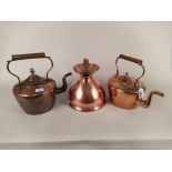 Two large Victorian seamed copper kettles,